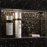 Close-up of a modern shower niche with integrated LED lighting from Schluter® KERDI-BOARD-NLT, professionally installed by Nova Bath Design in an Ottawa bathroom.